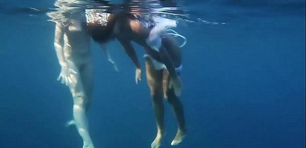  Naked girls on Tenerife having fun in the water